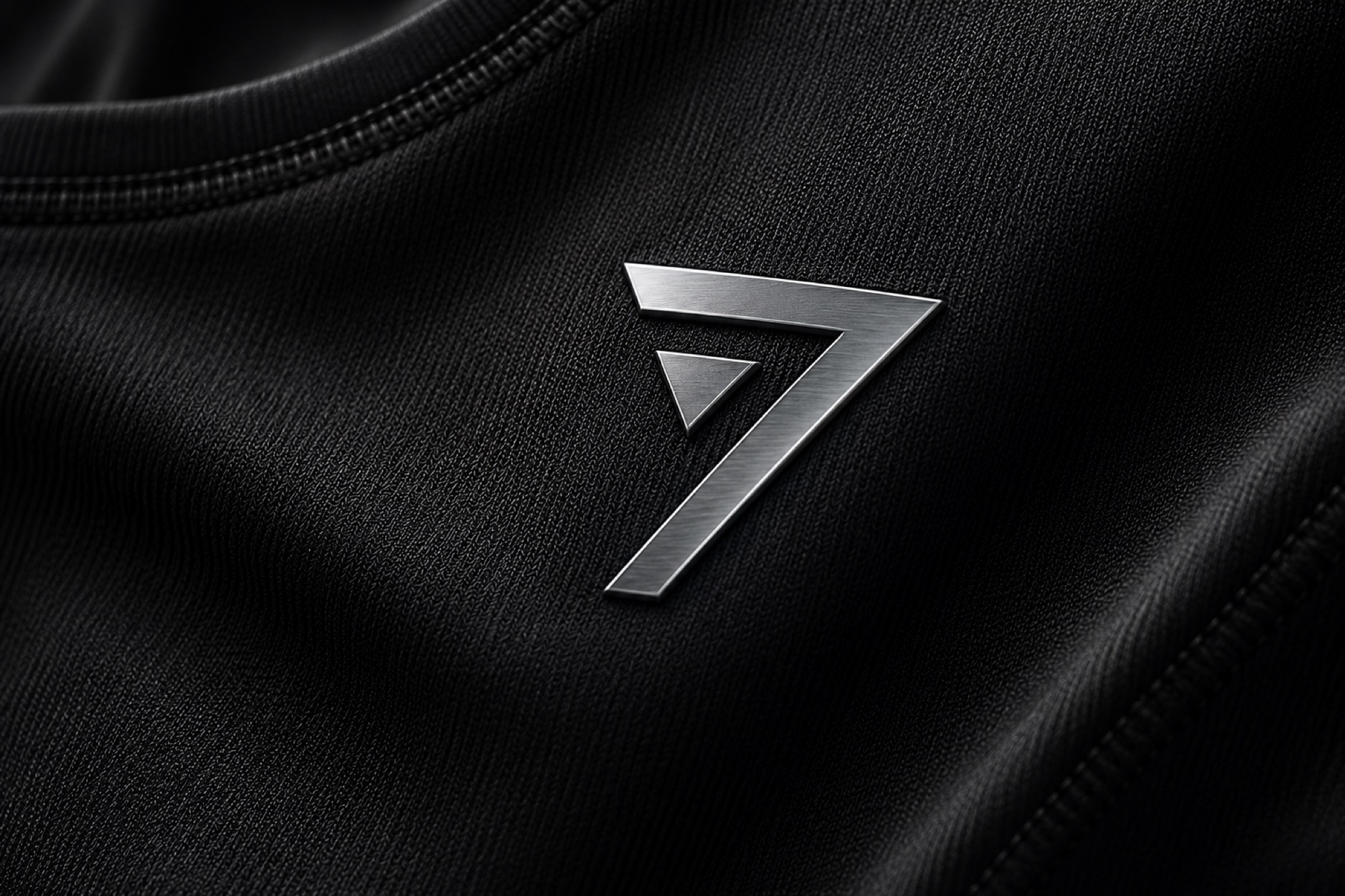 Level Seven metal badge